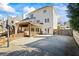 This backyard features an outdoor kitchen, covered deck and basketball court at 2130 Waters Ferry Dr, Lawrenceville, GA 30043
