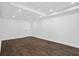 Finished basement with vinyl floors, bright lighting, and ample space for activities at 2130 Waters Ferry Dr, Lawrenceville, GA 30043