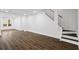 Finished basement with stairs, large windows, and recessed lights, perfect for flexible use at 2130 Waters Ferry Dr, Lawrenceville, GA 30043