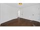 Bright, airy bedroom features hardwood floors, white trim, and natural light from the window, creating a welcoming retreat at 2130 Waters Ferry Dr, Lawrenceville, GA 30043
