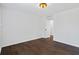 Bright, airy bedroom features hardwood floors, white trim, and natural light from the window, creating a welcoming retreat at 2130 Waters Ferry Dr, Lawrenceville, GA 30043