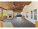 This deck features a fireplace, bar seating, and wood ceiling at 2130 Waters Ferry Dr, Lawrenceville, GA 30043