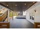 This covered deck features string lights and wood ceiling at 2130 Waters Ferry Dr, Lawrenceville, GA 30043