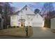 Charming two-story home with a well-manicured lawn, traditional architecture, and a welcoming entrance at 2130 Waters Ferry Dr, Lawrenceville, GA 30043