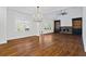Spacious living room features vaulted ceilings, hardwood floors, fireplace and built-in shelving units at 2130 Waters Ferry Dr, Lawrenceville, GA 30043