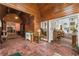 Inviting entryway with wood accents, brick floors, and views into other rooms at 2977 Glover Dr, Cumming, GA 30040