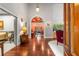 Elegant foyer with hardwood floors, chandelier, and stained glass entryway at 2977 Glover Dr, Cumming, GA 30040