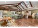 Open floor plan includes kitchen, dining, and staircase with wood floors at 2977 Glover Dr, Cumming, GA 30040