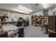 Versatile office space with built-in desk, bookshelves, and natural light, perfect for productivity and organization at 2977 Glover Dr, Cumming, GA 30040