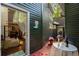 Outdoor patio with table, chairs, and view of the house and surrounding greenery at 2977 Glover Dr, Cumming, GA 30040