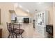 Charming kitchenette with granite countertops, bar seating, and a built-in hutch, ideal for casual meals and gatherings at 12103 Windrush Ln, Alpharetta, GA 30009
