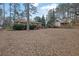 Expansive backyard offering ample space and complemented by mature trees and lush landscaping at 4222 Webb Rd, Tucker, GA 30084