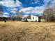 Large backyard offers privacy and space for outdoor living at 1902 Mack Rd, Douglasville, GA 30135