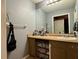 Bathroom featuring a large mirror over a vanity with a single sink at 1902 Mack Rd, Douglasville, GA 30135