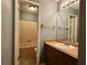 Bathroom featuring a single sink vanity and tile shower at 1902 Mack Rd, Douglasville, GA 30135