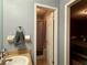 Bathroom with a single sink vanity and access to a shower and bedroom at 1902 Mack Rd, Douglasville, GA 30135