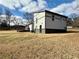 View of the rear exterior showcasing the deck at 1902 Mack Rd, Douglasville, GA 30135