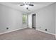 Bedroom with neutral walls and carpet at 4315 Summit Heights Dr, Snellville, GA 30039