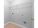 Laundry room with tile floor and wire rack at 4315 Summit Heights Dr, Snellville, GA 30039