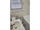 Functional bathroom featuring tile walls, a clean sink, and a bathtub perfect for relaxation at 2368 Jernigan Se Pl, Atlanta, GA 30315