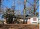 Charming brick home featuring a well-maintained lawn and a classic architectural style at 2368 Jernigan Se Pl, Atlanta, GA 30315