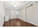 Finished basement with hardwood floors, utility area, and natural light at 2610 Crestdale Se Cir, Atlanta, GA 30316
