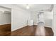 Finished basement with hardwood floors, utility area, and storage space at 2610 Crestdale Se Cir, Atlanta, GA 30316