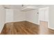 Finished basement space featuring wood-look flooring and neutral paint. Ready to be converted to a rec room, office, or gym at 2610 Crestdale Se Cir, Atlanta, GA 30316