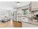 A bright kitchen featuring stainless steel appliances and an adjacent dining area at 2610 Crestdale Se Cir, Atlanta, GA 30316