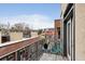 Cozy balcony with a metal railing and a small table with a chair, perfect for enjoying the city views at 307 Cherokee Se Ave # 3, Atlanta, GA 30312