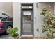 Modern front entrance featuring a gray door, stylish lighting, and attractive landscaping, creating curb appeal at 307 Cherokee Se Ave # 3, Atlanta, GA 30312