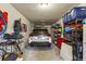 Well-organized garage with a parked car, storage shelves, and overhead lighting for convenience and functionality at 307 Cherokee Se Ave # 3, Atlanta, GA 30312