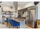 Modern kitchen with stainless steel appliances, a granite island, and custom cabinetry at 307 Cherokee Se Ave # 3, Atlanta, GA 30312