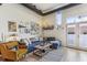 Cozy living room with a blue sectional couch and natural light streaming in at 307 Cherokee Se Ave # 3, Atlanta, GA 30312
