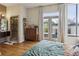 Bright bedroom features large windows, hardwood floors, and ensuite bathroom at 307 Cherokee Se Ave # 3, Atlanta, GA 30312