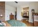 Inviting bedroom with hardwood floors, walk-in closet, and connected bathroom at 307 Cherokee Se Ave # 3, Atlanta, GA 30312