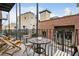 Cozy outdoor patio with seating and views of surrounding buildings at 307 Cherokee Se Ave # 3, Atlanta, GA 30312