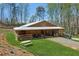 Scenic view of Big Creek Farm, a beautiful wooden barn with picturesque surroundings at 5388 Frazer Rd, Buford, GA 30518