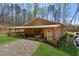 Exterior view of Big Creek Farm, featuring wooden barn at 5388 Frazer Rd, Buford, GA 30518