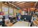 Unfinished basement storage with natural light, perfect for organizing belongings at 5388 Frazer Rd, Buford, GA 30518