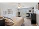 Bedroom with neutral walls and large window at 5388 Frazer Rd, Buford, GA 30518