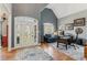 Elegant foyer with grand entrance door and adjacent office space with natural light at 5388 Frazer Rd, Buford, GA 30518