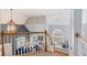 View of the foyer with beautiful railing and large windows at 5388 Frazer Rd, Buford, GA 30518