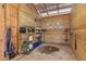 A horse wash rack area in the barn with water and wash equipment at 5388 Frazer Rd, Buford, GA 30518