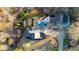 Expansive property featuring a private pool, mature landscaping and long driveway at 114 Hardwood Ln, Canton, GA 30115