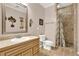 Well-appointed bathroom with stone tile shower and vanity at 114 Hardwood Ln, Canton, GA 30115