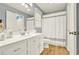 Bright bathroom with white cabinets, modern fixtures, and a neutral color scheme at 114 Hardwood Ln, Canton, GA 30115