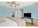 Comfortable bedroom with a ceiling fan and wood floors, perfect for relaxation at 114 Hardwood Ln, Canton, GA 30115