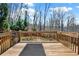 A spacious wood deck overlooking the backyard, perfect for outdoor gatherings and relaxation at 114 Hardwood Ln, Canton, GA 30115