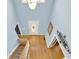 Foyer with hardwood floors, staircase, and front door at 114 Hardwood Ln, Canton, GA 30115
